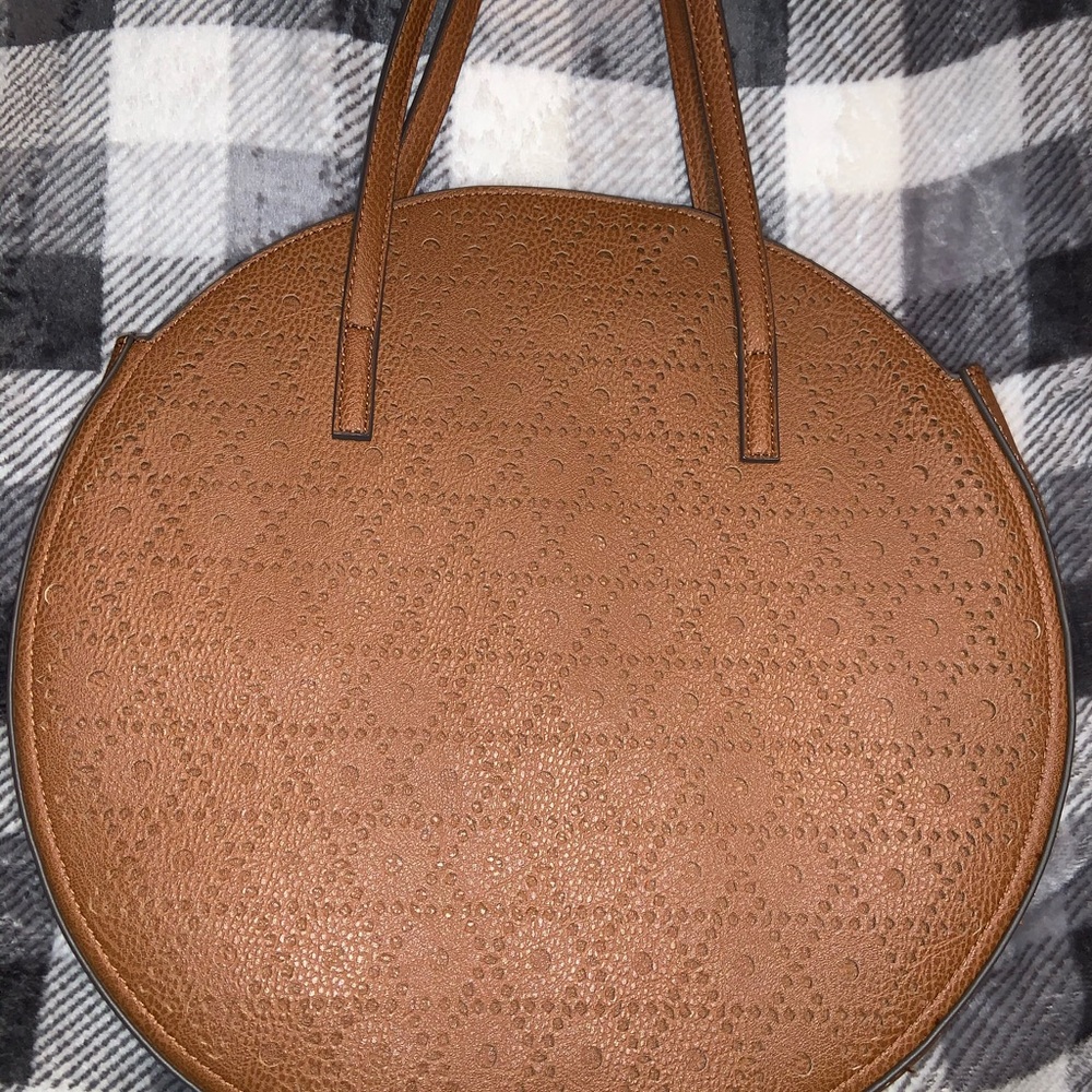 Carlos Santana circle bag.